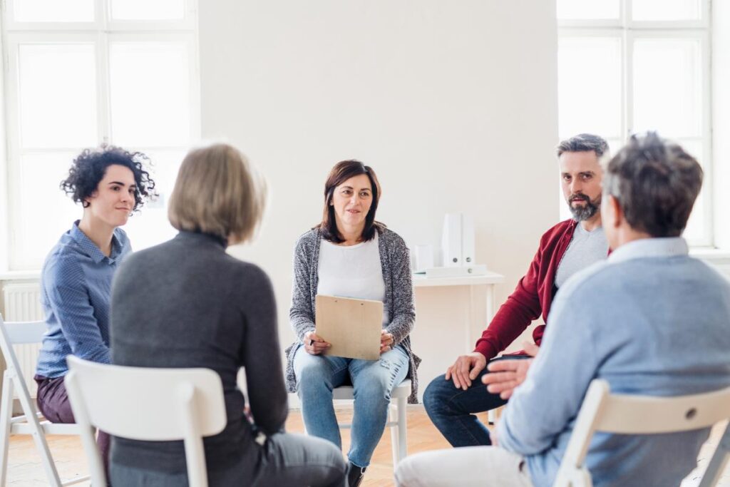 A group of people in relapse prevention therapy