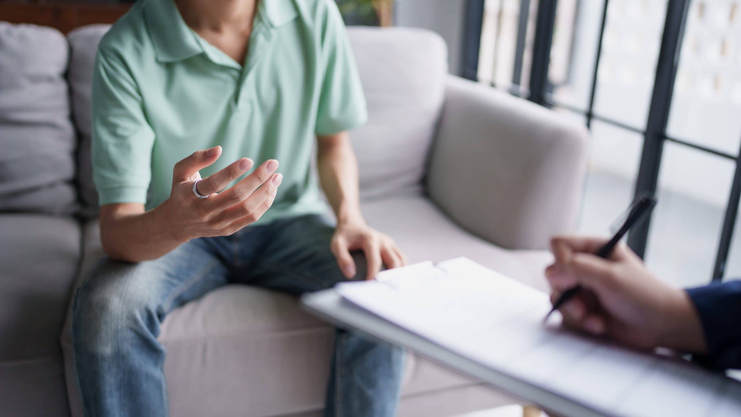 Man talking to his therapist about what is the best treatment for dual diagnosis​.