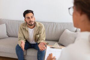 Man talking to drug and alcohol intervention specialist.