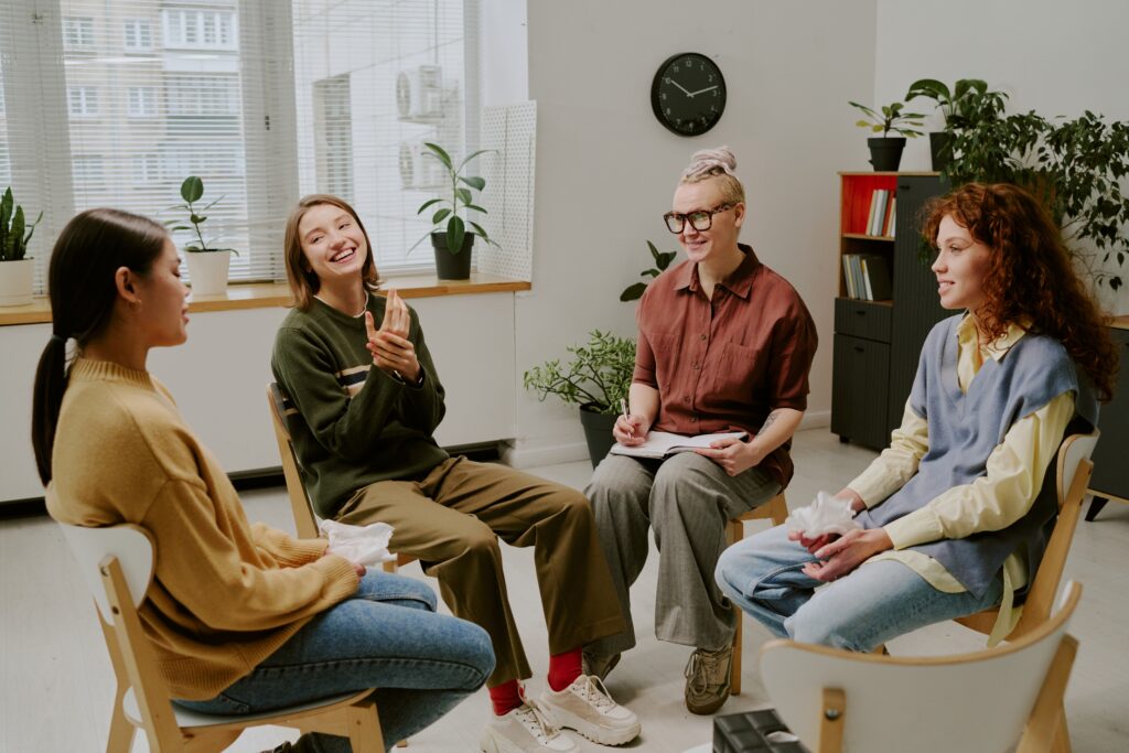 Group of women talking about what are process groups.